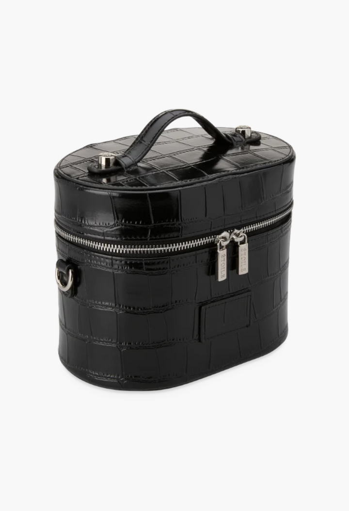 GLAM MODA black oval toiletry case in croc-embossed vegan leather with a top handle and silver dual zipper hardware.