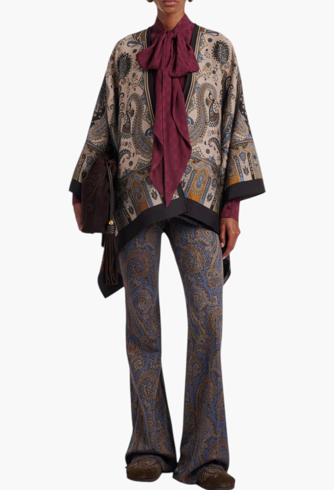 GLAM MODA Birkenstock Boston brown suede clogs with intricate embroidery worn by a model in a paisley outfit