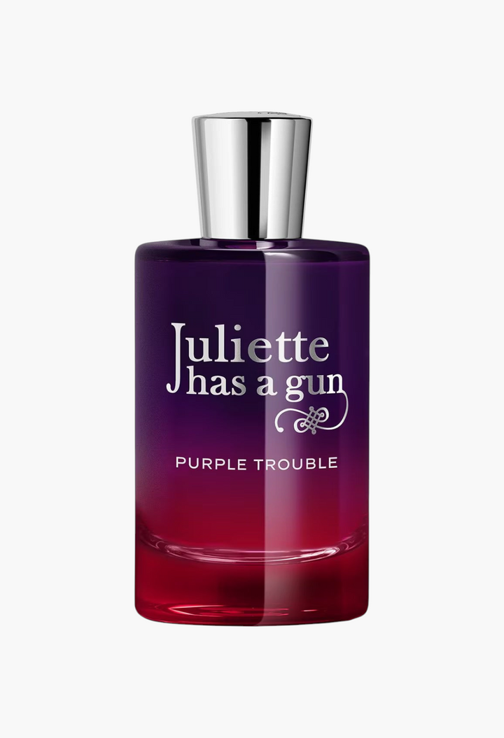 GLAM MODA Juliette Has A Gun Purple Trouble perfume bottle with a purple and red gradient glass design.