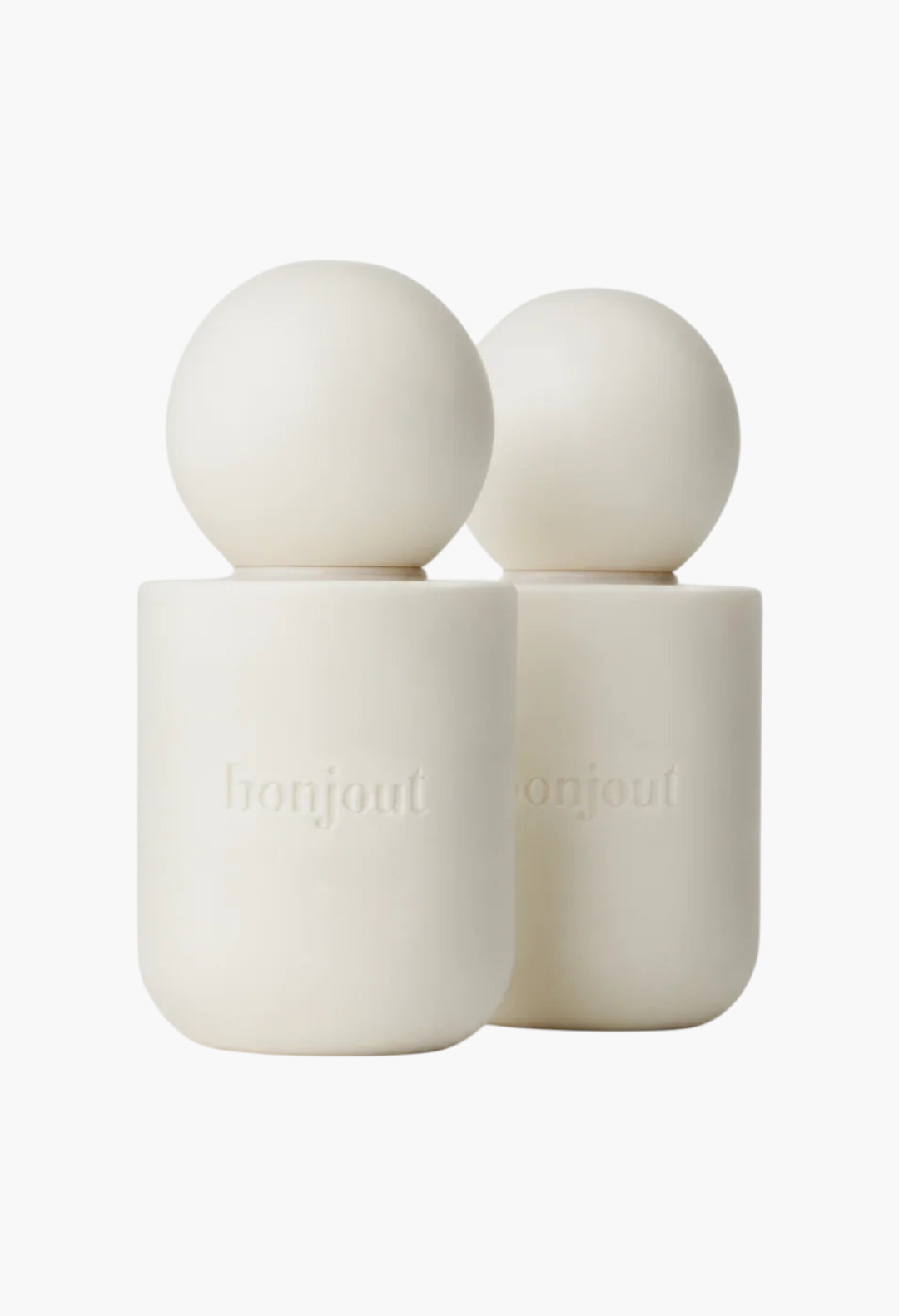GLAM MODA La Cream Duo Skin Longevity Crème set in minimalist white cylindrical bottles with spherical caps.