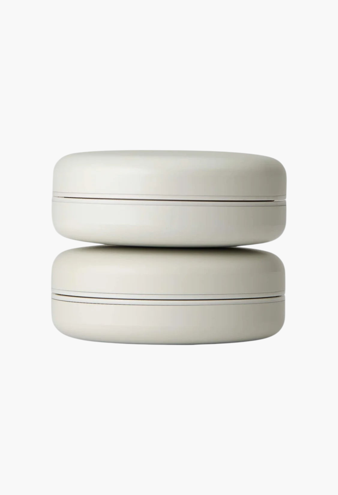GLAM MODA Le Balm Duo solid serum set in minimalist beige round containers stacked on a white background