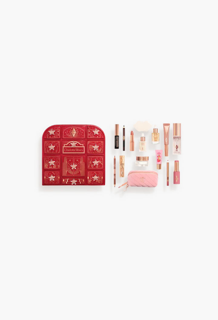 GLAM MODA Charlotte Tilbury Hollywood beauty advent calendar with 15 makeup and skincare products in a red star box.