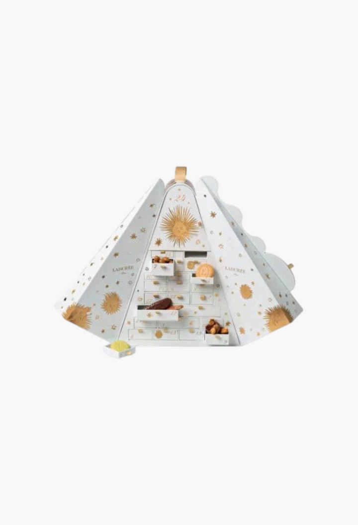 GLAM MODA Laduree 2026 advent calendar in a white pyramid shape with gold sun and star illustrations and small drawers.