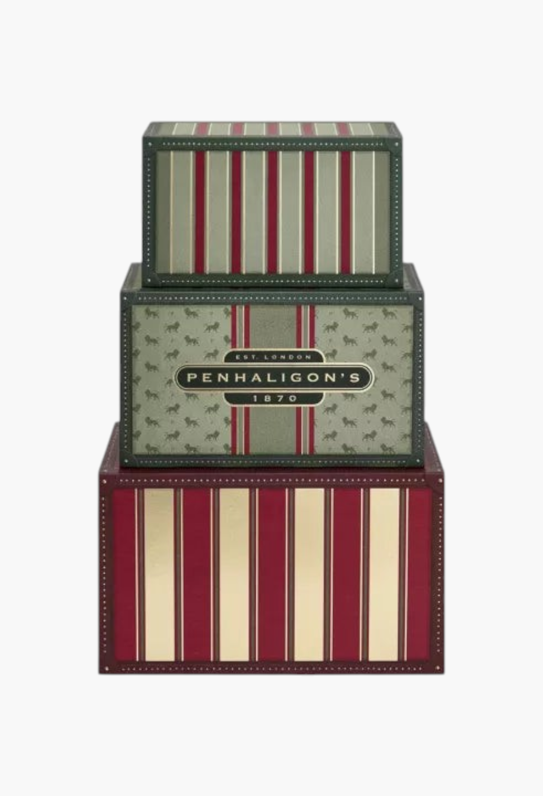 GLAM MODA Penhaligon's 2026 advent calendar featuring stacked vintage-style travel trunk boxes in red and green.