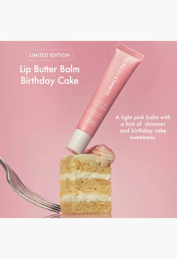 GLAM MODA Birthday Cake lip butter balm tube balanced on a slice of cake with a silver fork