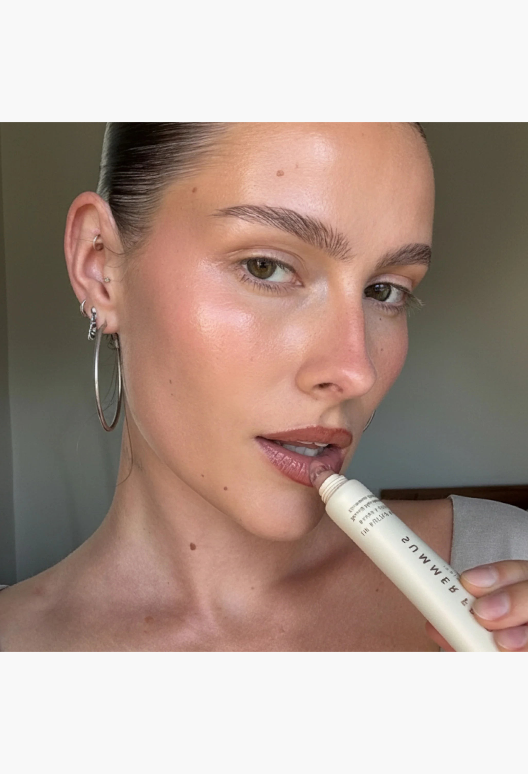 GLAM MODA toasted marshmallow lip butter balm applied on model lips for a hydrated and glowing finish