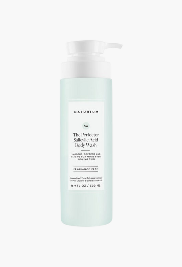 GLAM MODA Naturium The Perfector Salicylic Acid Body Wash in a light blue pump bottle for exfoliating skin.