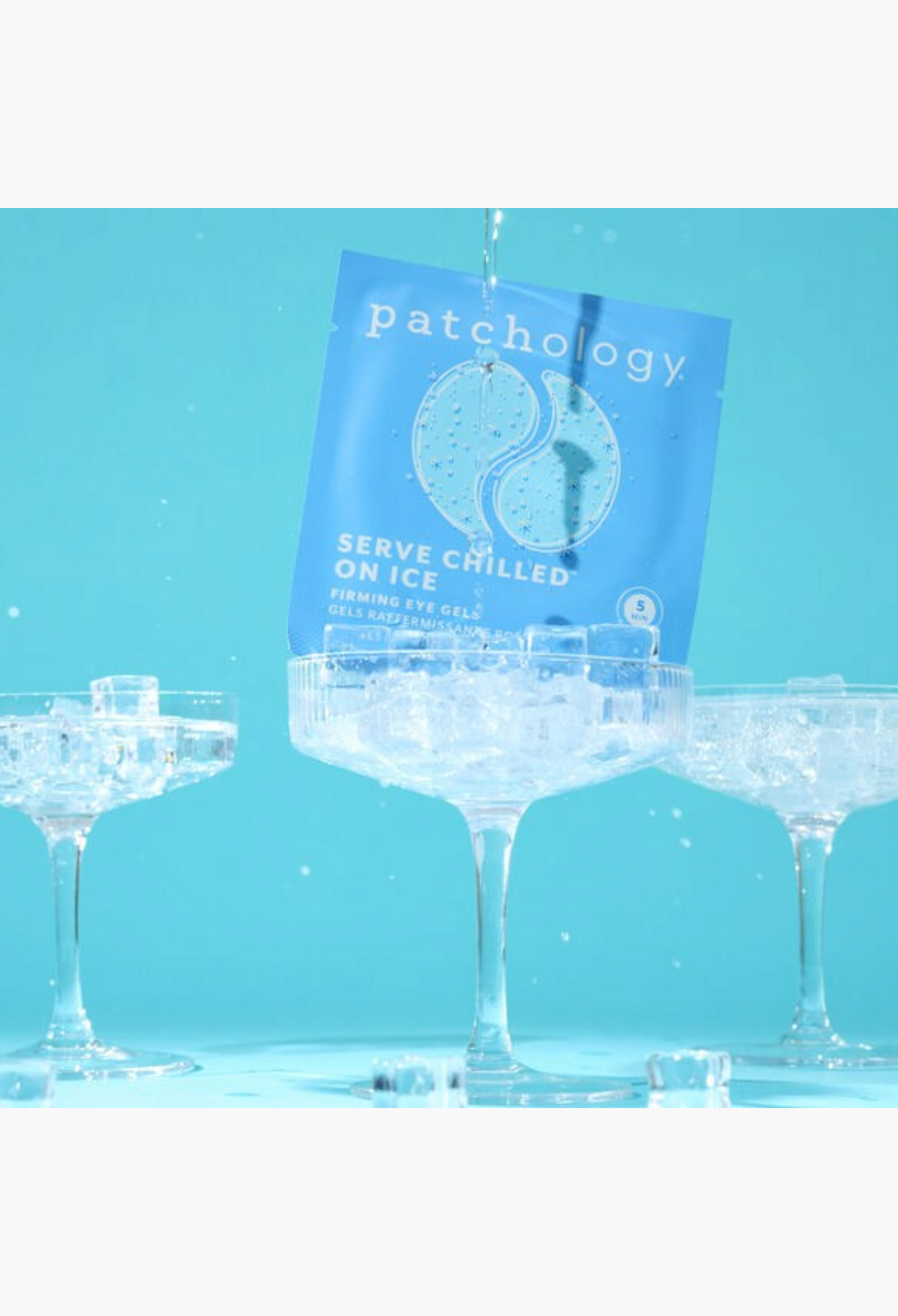 GLAM MODA Patchology Serve Chilled on Ice firming eye gel mask sachet balanced on a glass with ice cubes and water