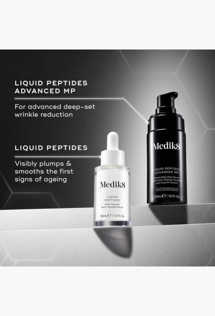 GLAM MODA Medik8 Liquid Peptides and Advanced MP serum bottles on a metallic surface for anti-ageing skincare.