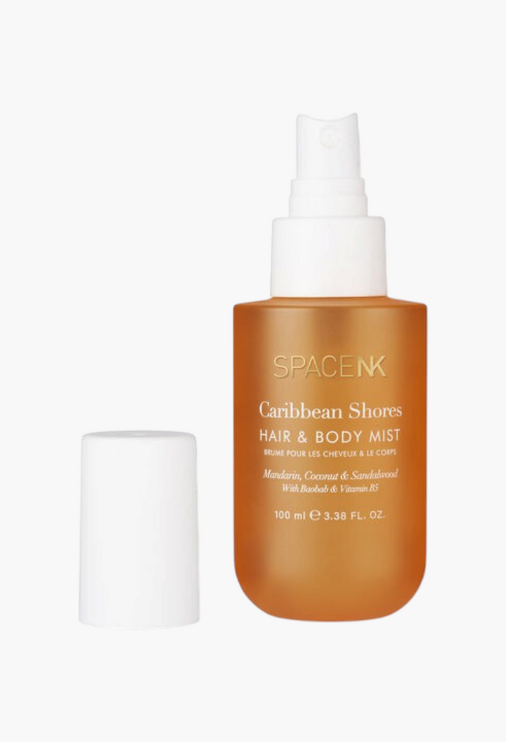 GLAM MODA Caribbean Shores hair and body mist in an orange frosted bottle with a white spray pump and cap.
