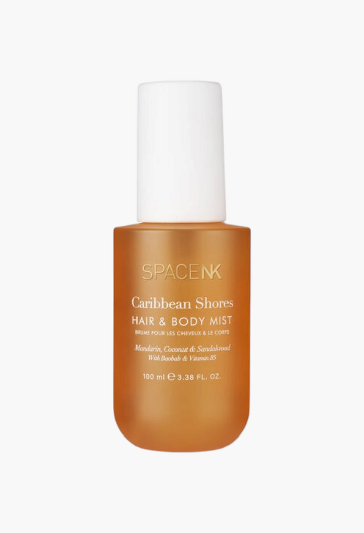 GLAM MODA Caribbean Shores hair and body mist in a frosted amber bottle with a white pump cap.