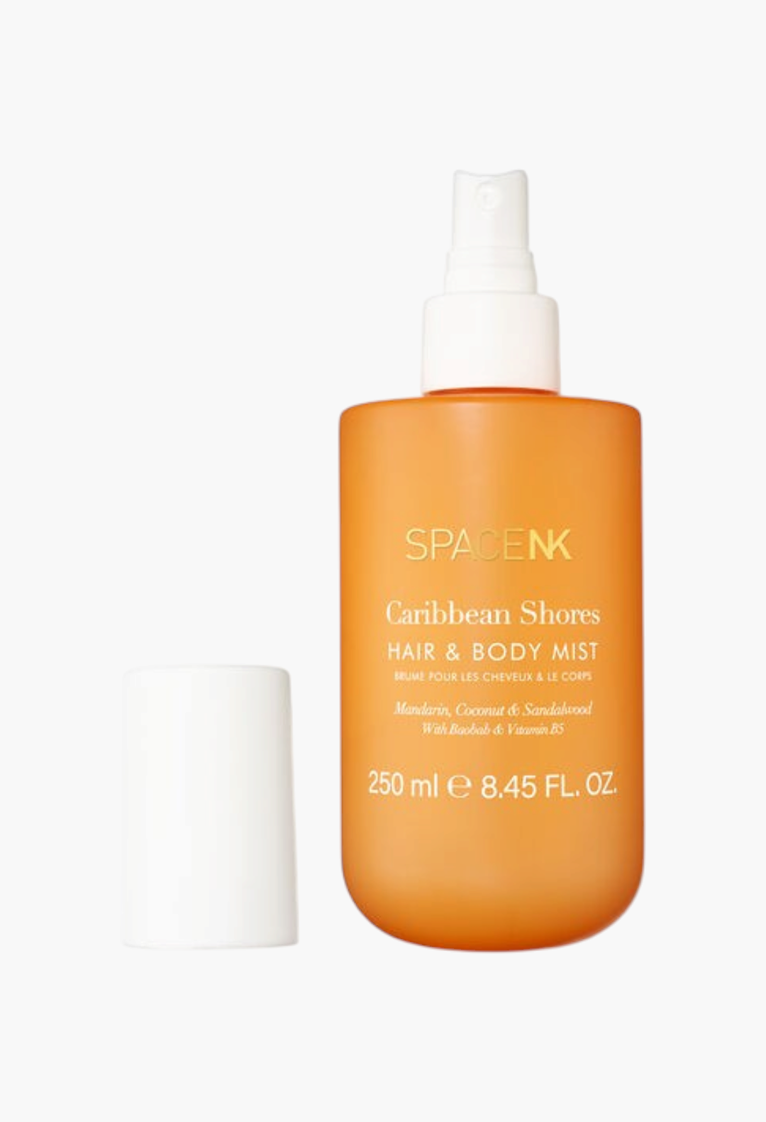 GLAM MODA Caribbean Shores hair and body mist in an orange bottle with a white spray pump and cap