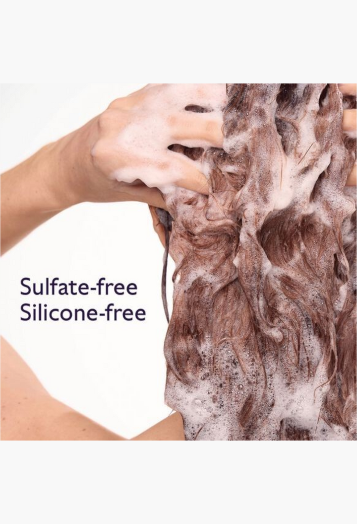 GLAM MODA hair density and volume shampoo lathered into brown hair, highlighting sulfate-free and silicone-free formula