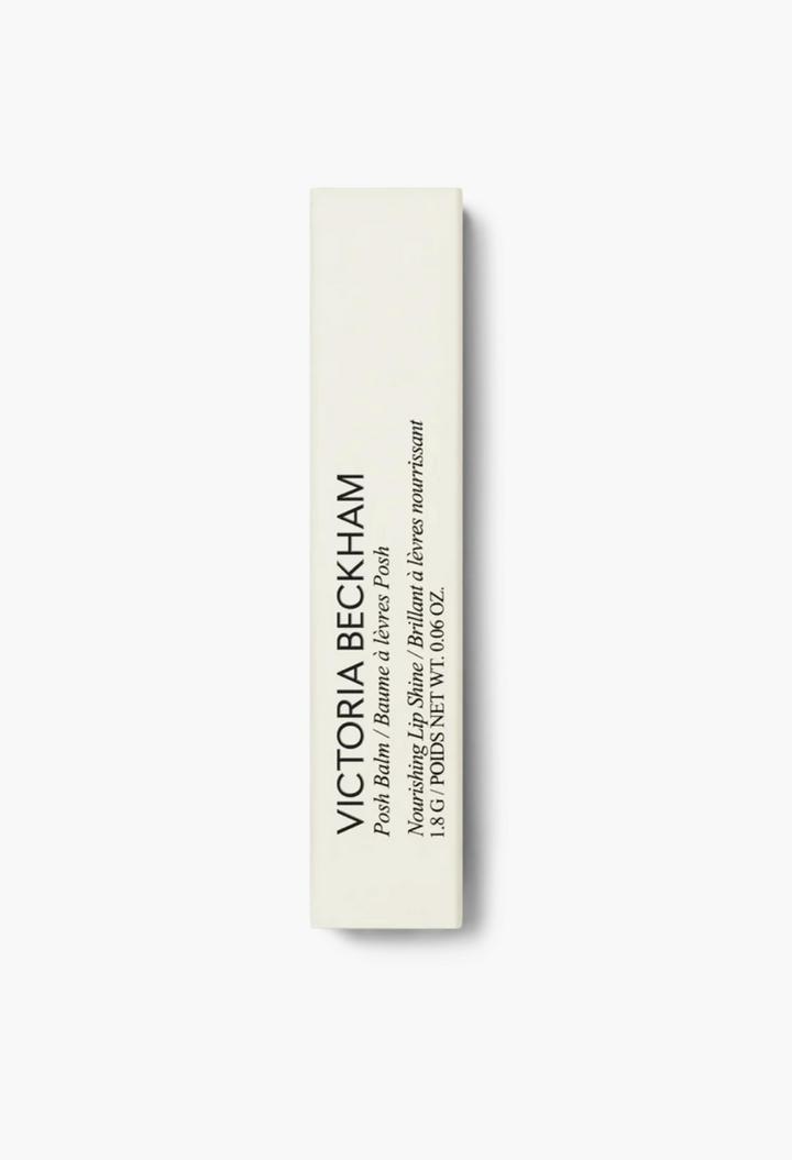 GLAM MODA Victoria Beckham Posh Balm Nourishing Lip Shine in a sleek white rectangular product box