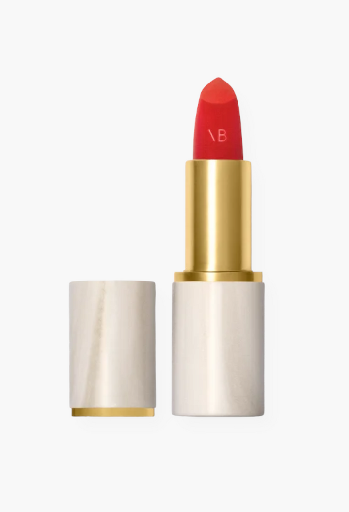 GLAM MODA Rouge Victoria matte red lipstick in a luxurious polished alabaster case with gold accents.