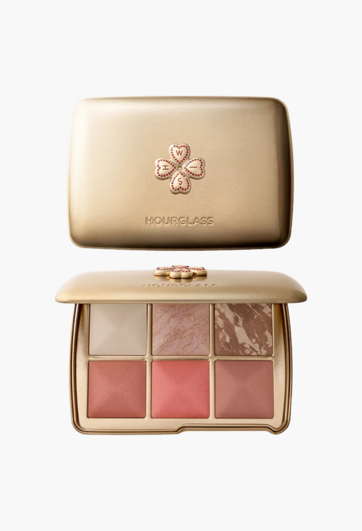 GLAM MODA Hourglass Ambient Lighting Edit Unlocked palette in a gold tin case with a decorative Wish charm.