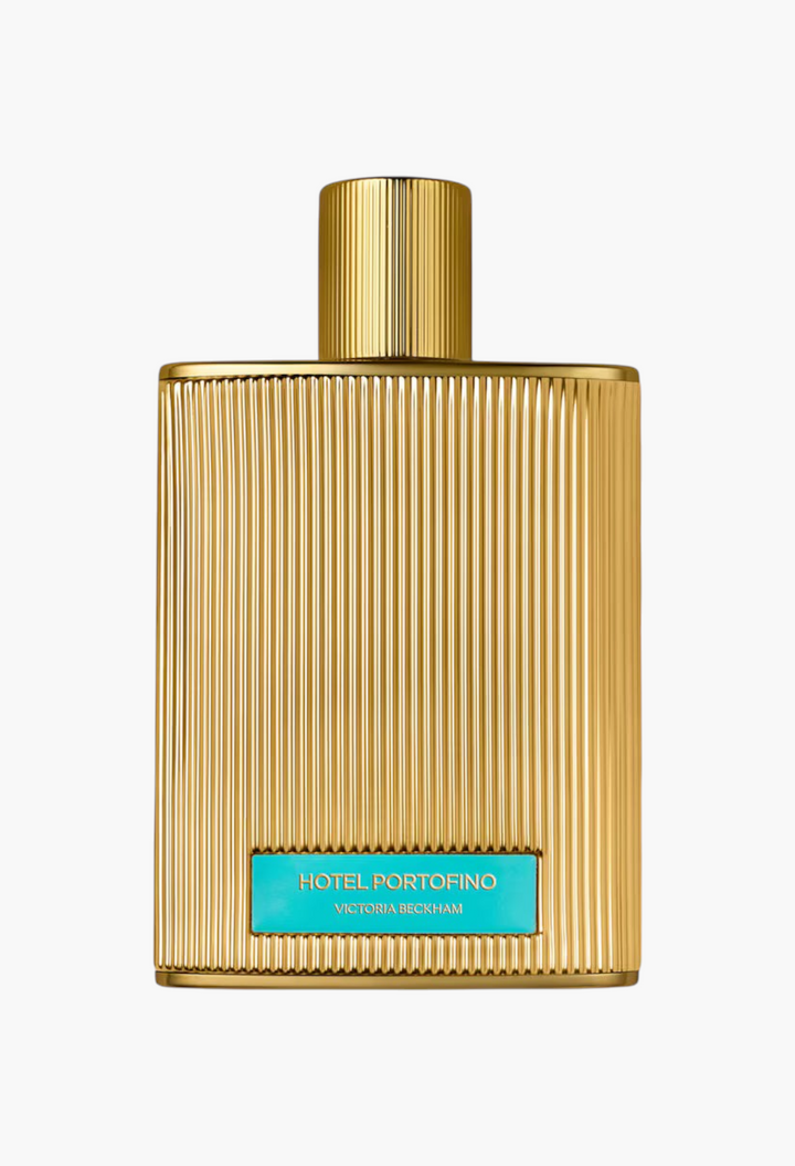 GLAM MODA Hotel Portofino Extrait de Parfum in a gold ribbed bottle with a turquoise label.