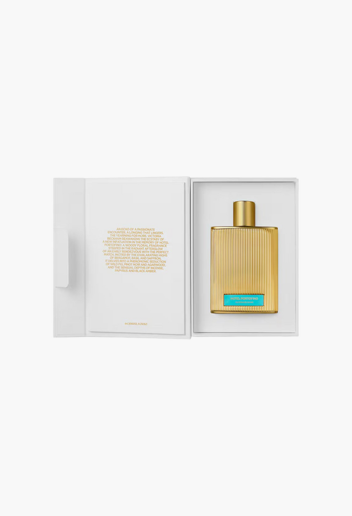 GLAM MODA Hotel Portofino extrait de parfum in a gold ribbed bottle presented inside an open white luxury gift box.