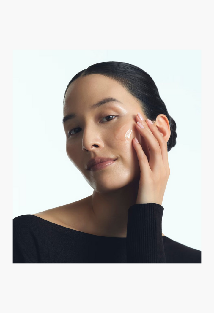 GLAM MODA 111SKIN Precision Peel applied to a woman's cheek for skin resurfacing and brightening treatment