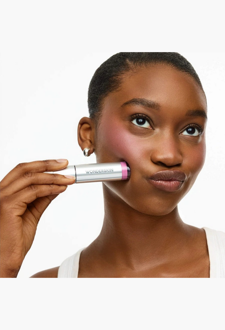 GLAM MODA model applying Wonderskin Wonder Blading long-lasting pink blush stain to her cheek
