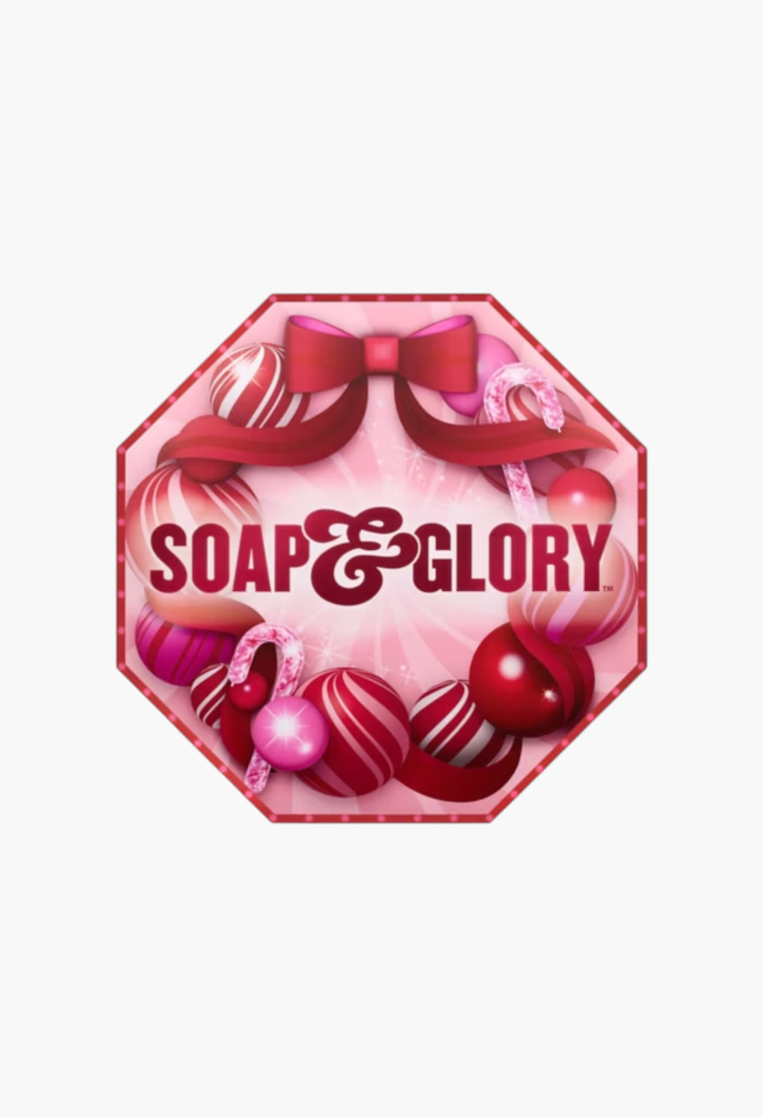 GLAM MODA Soap & Glory 24-piece advent calendar featuring festive pink and red holiday ornaments and a decorative bow.