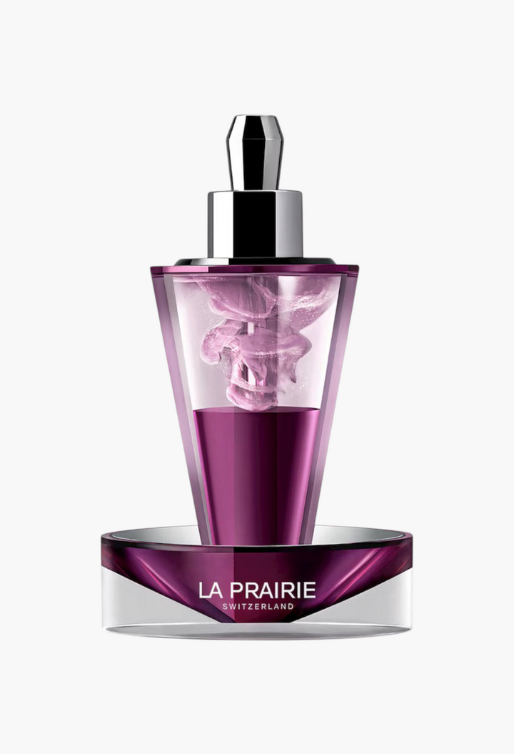 GLAM MODA La Prairie Platinum Rare Haute-Rejuvenation Protocol serum vial in a purple glass bottle with silver base.