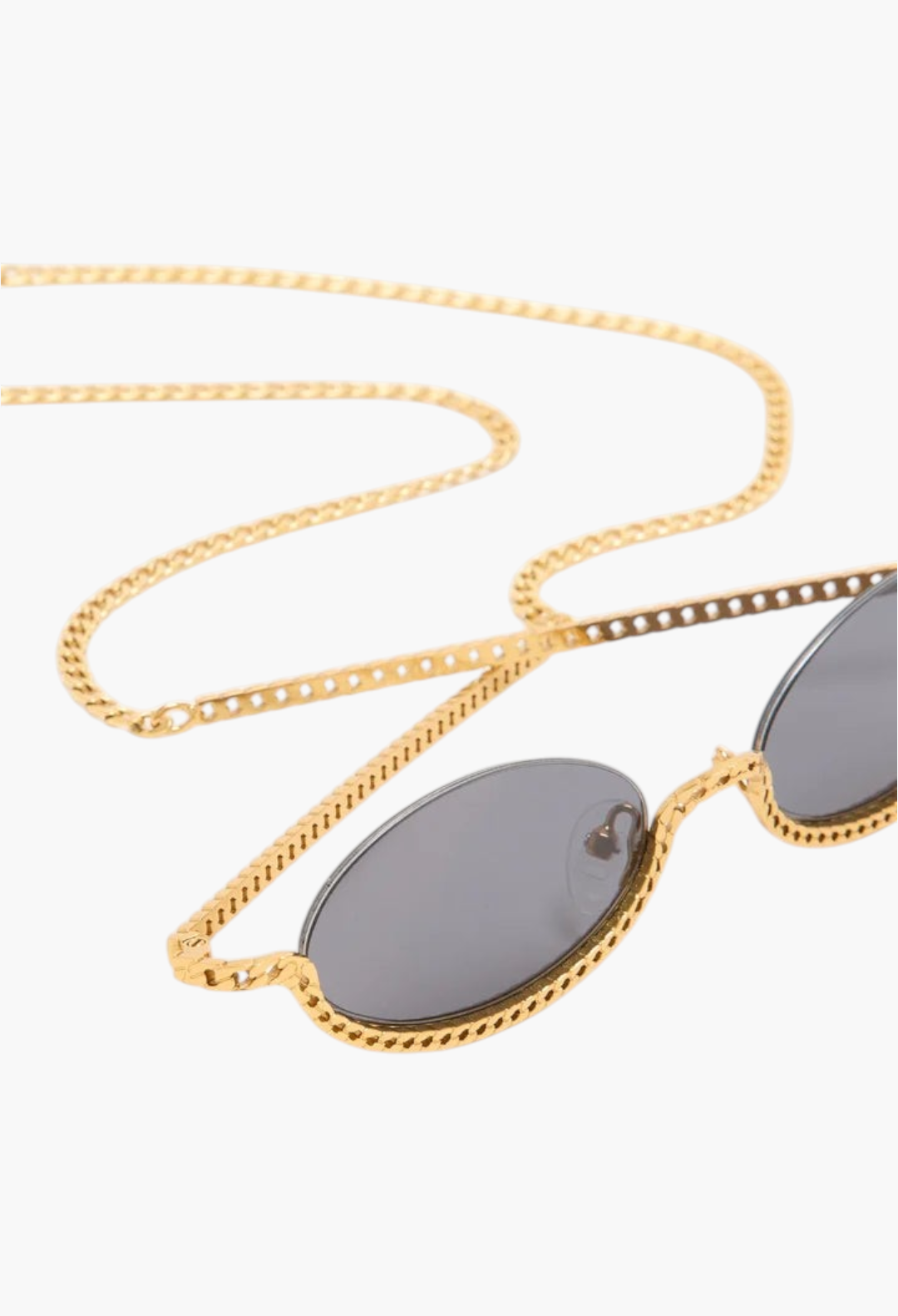 GLAM MODA Gaga sunglasses featuring gold metal sculptural frames with an integrated chain detail and dark lenses.