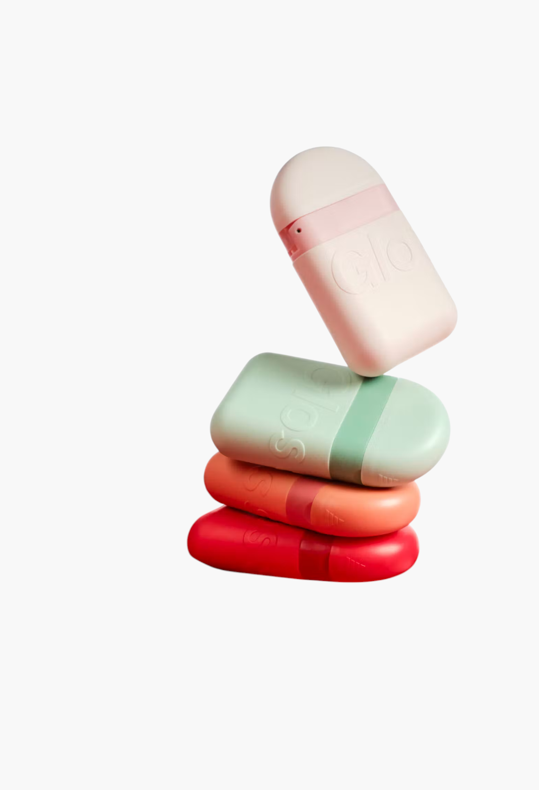 GLAM MODA moisturizing hand cream pods in a stack of pastel and vibrant colours with a compact, easy-squeeze design.