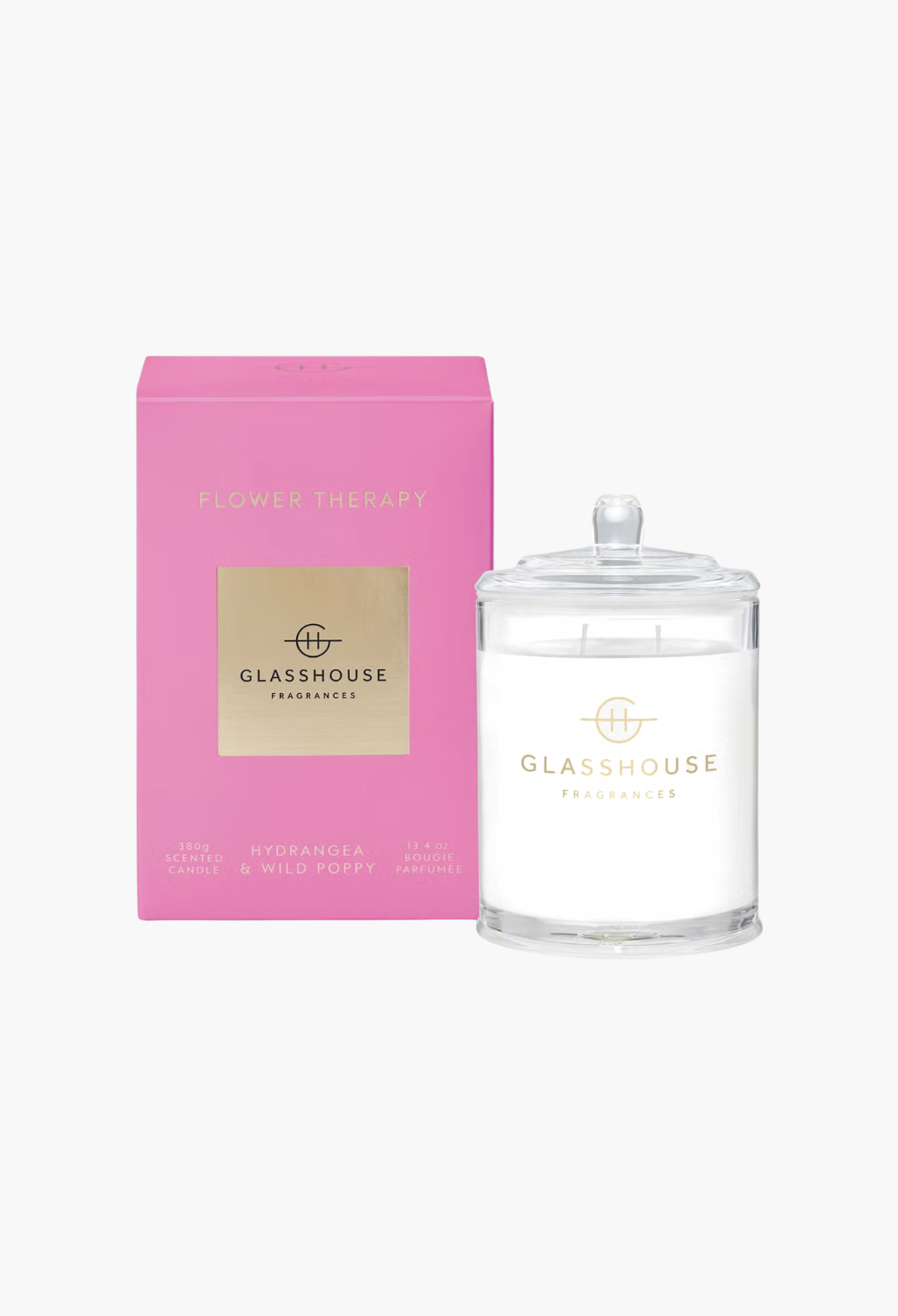 GLAM MODA Glasshouse Fragrances Flower Therapy scented soy candle in a glass jar with a matching pink gift box.