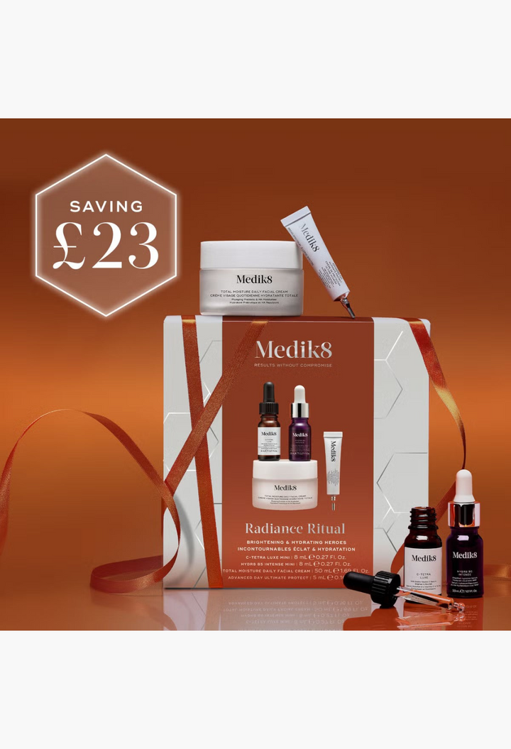 GLAM MODA Medik8 Radiance Ritual skincare set featuring four brightening and hydrating facial products in a gift box.