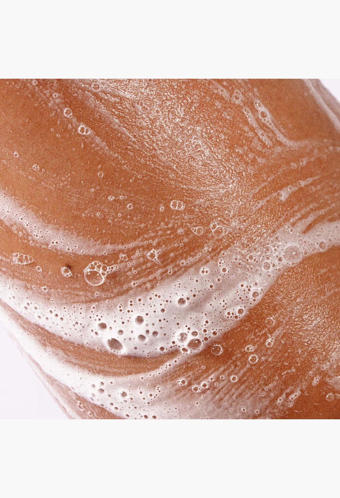 GLAM MODA Megababe Bidet Bar feminine cleansing soap lathering on skin for gentle pH balanced intimate care