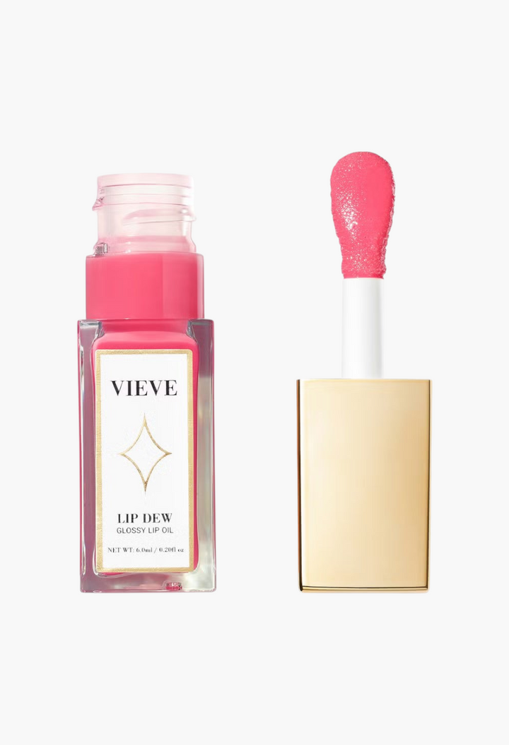 GLAM MODA VIEVE Lip Dew glossy lip oil in a clear bottle with a pink cap and a soft applicator wand.
