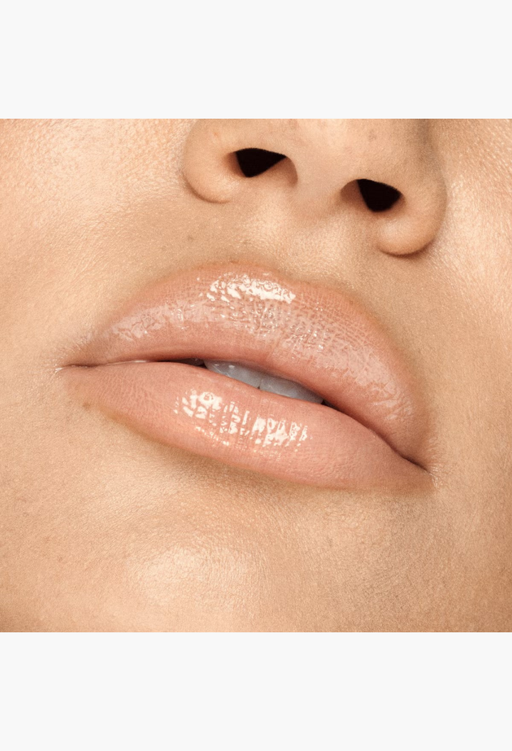 GLAM MODA VIEVE Lip Dew applied on lips for a high-shine, glossy, and luminous finish.