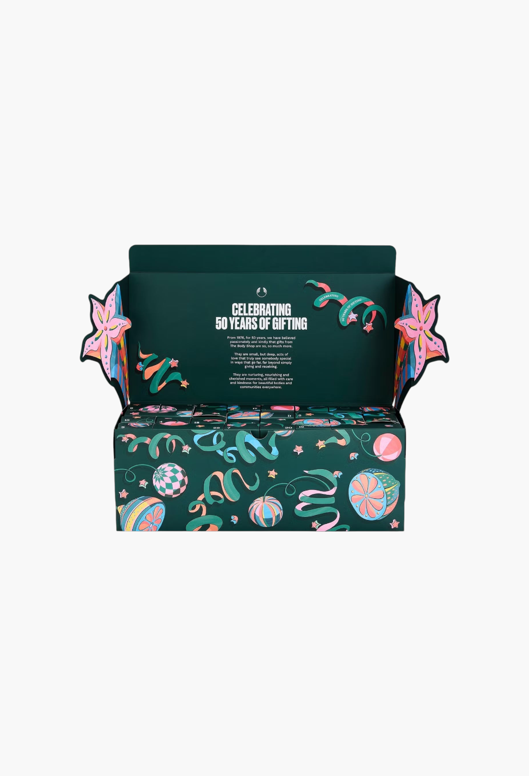 GLAM MODA The Body Shop Core Advent Calendar with festive green packaging and colourful ribbon and star illustrations.