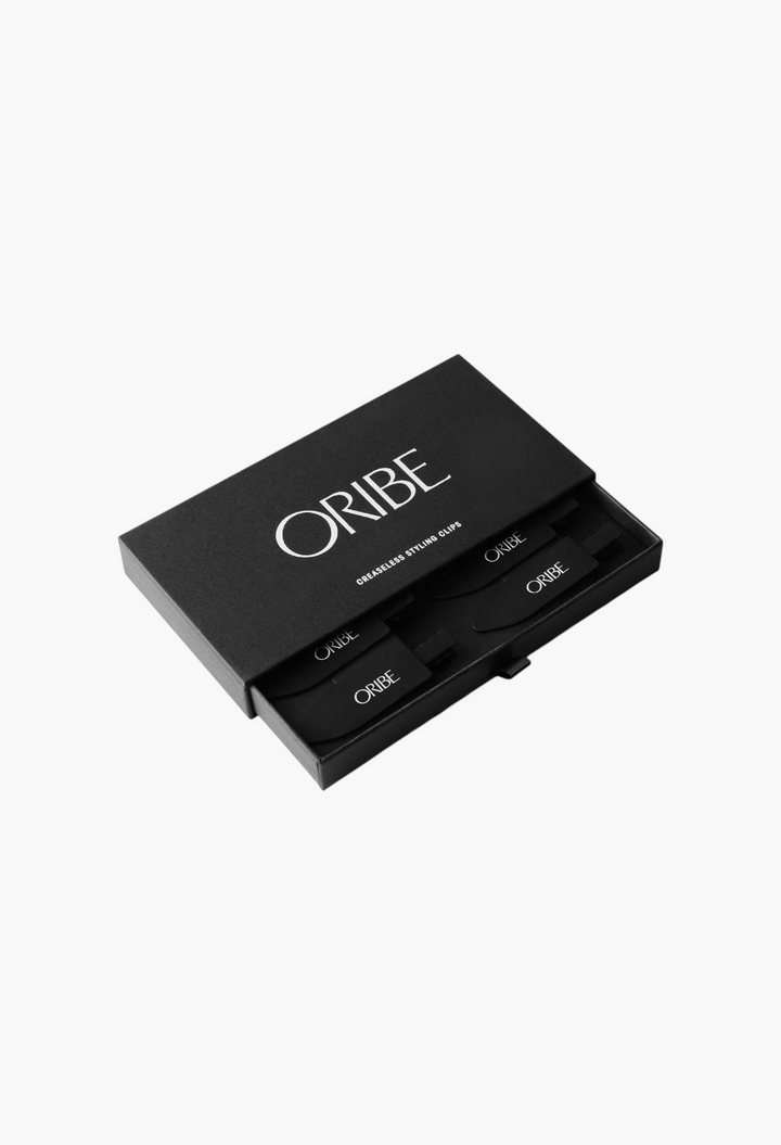 GLAM MODA Oribe creaseless styling clips in a black branded presentation box for professional hair styling