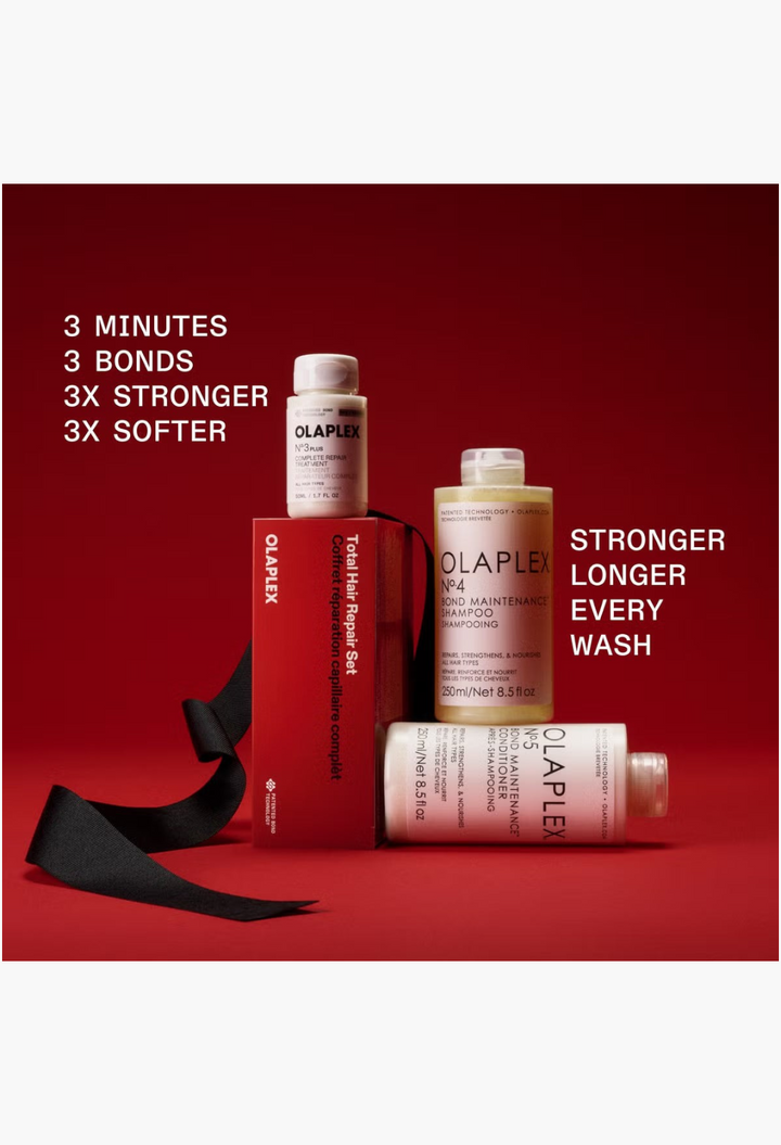 GLAM MODA Olaplex Total Hair Repair Set featuring bond-building shampoo, conditioner, and treatment bottles with ribbon.