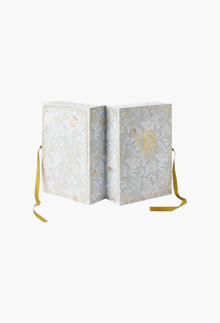GLAM MODA Cult Beauty Advent Calendar Special Edition featuring intricate botanical illustrations and gold ribbons.