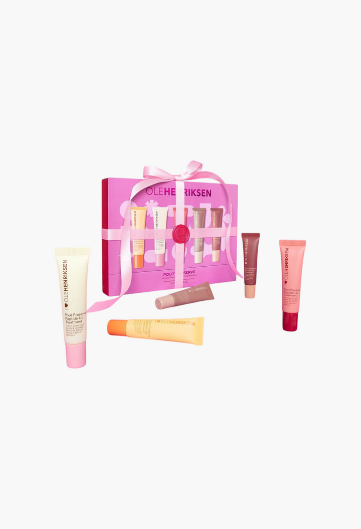 GLAM MODA Ole Henriksen Pout Preserve Lip Vault 2.0 featuring five hydrating peptide lip treatment tubes in a gift box.