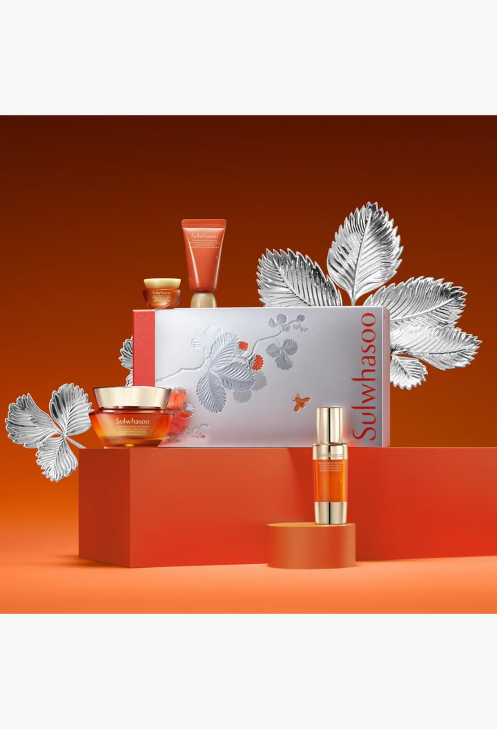 GLAM MODA Sulwhasoo Concentrated Ginseng Rejuvenating Cream set featuring four skincare products on orange pedestals.