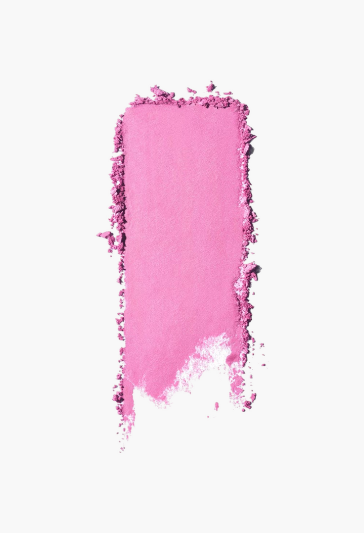 GLAM MODA Saie SuperSuede Radiant Blush powder swatch in a vibrant pink shade with a smooth, matte finish.
