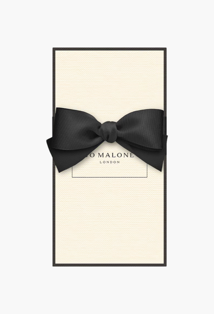 GLAM MODA English Oak & Hazelnut cologne gift box in cream with a black border and elegant black ribbon bow