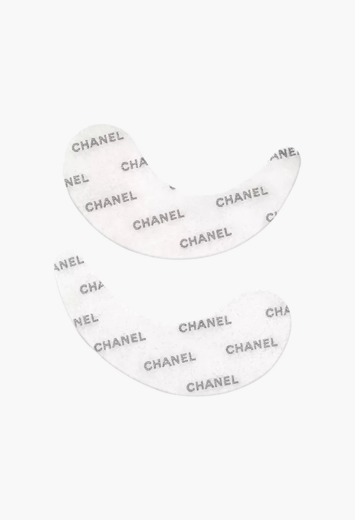 GLAM MODA Chanel Le Lift Flash Eye patches with a white surface and repeating silver Chanel logo branding