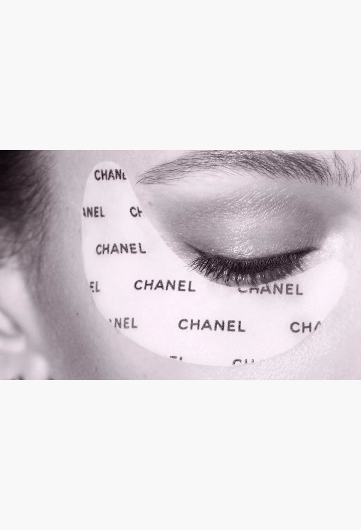 GLAM MODA Chanel Le Lift Flash Eye patch applied under a closed eye to reduce puffiness and fine lines