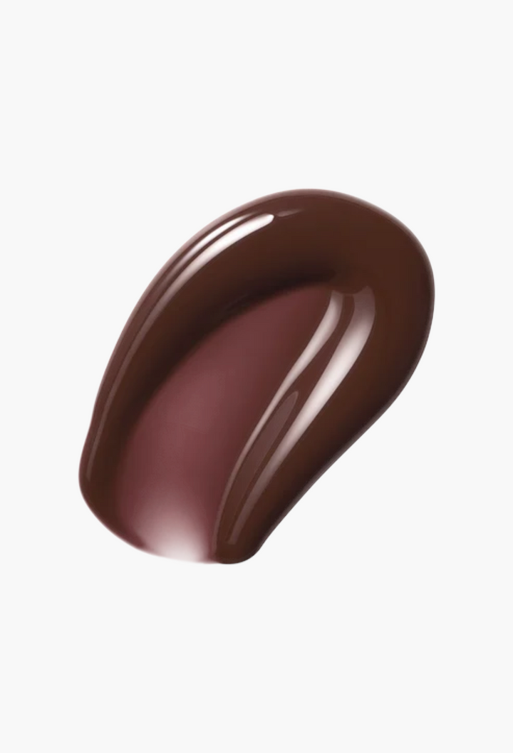 GLAM MODA Posh Gloss swatch in a deep, rich brown shade with a high-shine, lacquer-like finish.