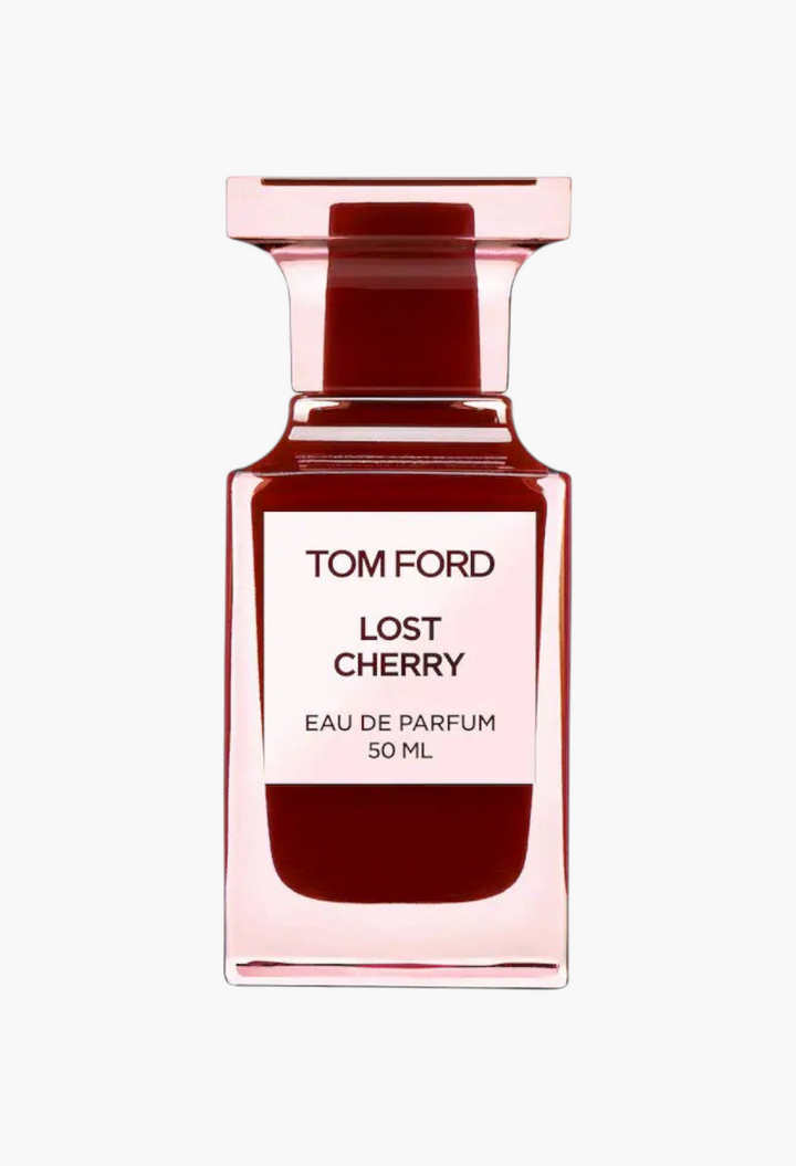 GLAM MODA Tom Ford Lost Cherry Eau de Parfum in a deep cherry-red glass bottle with a pale-pink label.