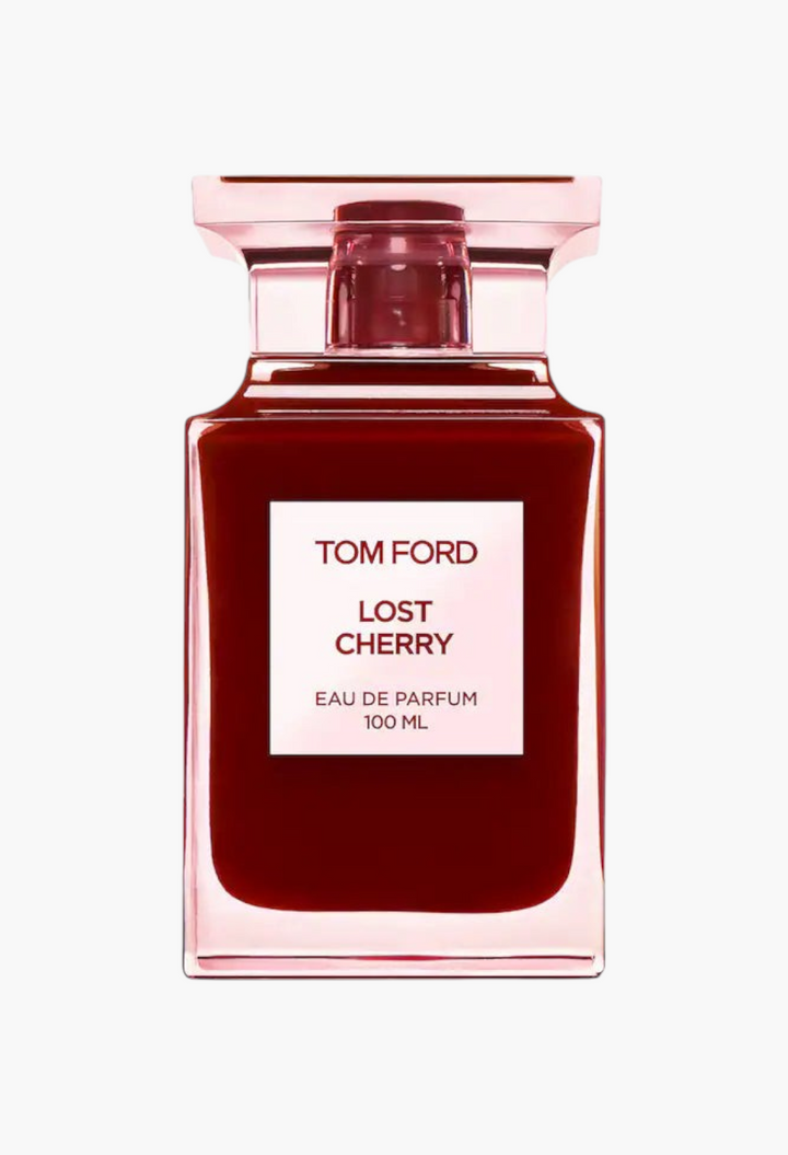 GLAM MODA Tom Ford Lost Cherry Eau de Parfum in a deep cherry-red glass bottle with a pale-pink label