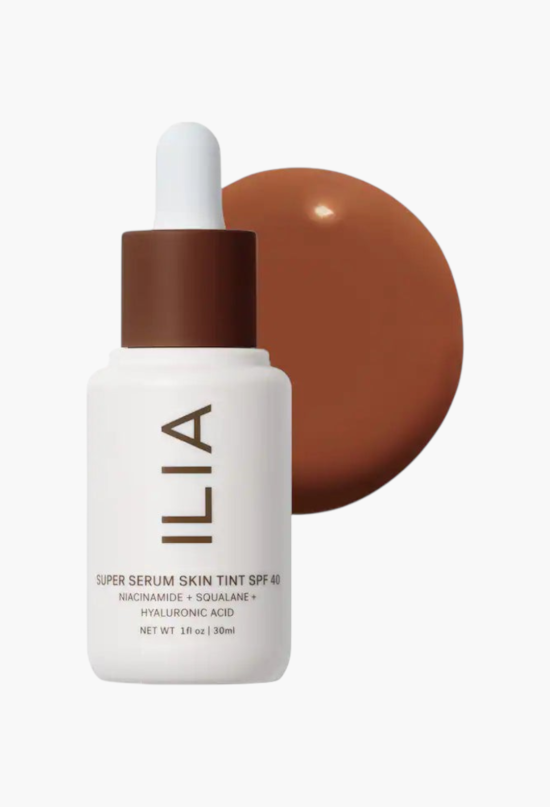GLAM MODA ILIA Super Serum Skin Tint SPF 40 in a deep shade with a dropper bottle and liquid foundation swatch