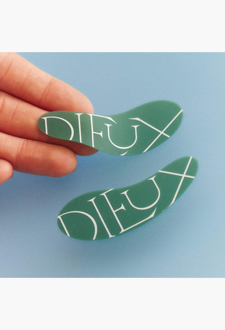 GLAM MODA reusable green silicone eye masks for under-eye hydration and skincare application