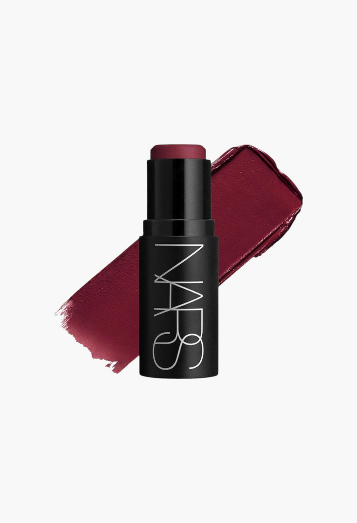 GLAM MODA NARS multipurpose cream-to-powder blush stick in a deep berry shade with a matching product swatch.