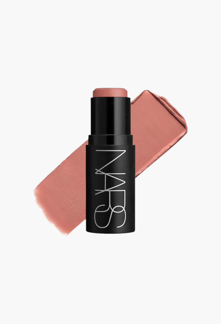 GLAM MODA NARS multipurpose soft blur blush stick in a dusty rose shade with a creamy texture swatch